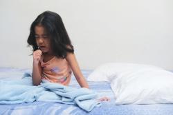 girl coughing 