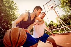 men playing basketball